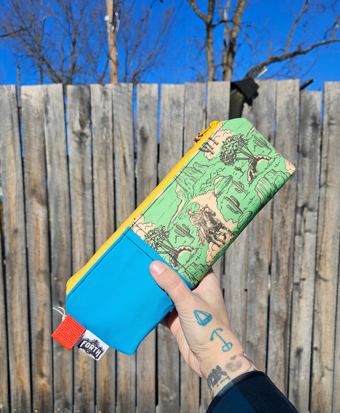 Long Hurry bag is half graphic canvas print half contrasting with an even more contrasting zipper! I add pull a pull tab and paracord on the zipper for ease of opening!