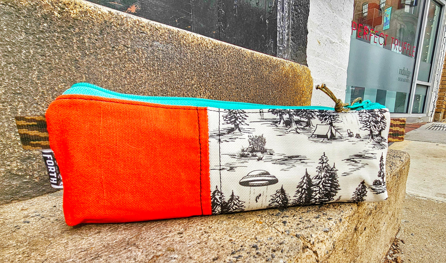 Long Hurry bag is half graphic canvas print half contrasting with an even more contrasting zipper! I add pull a pull tab and paracord on the zipper for ease of opening!